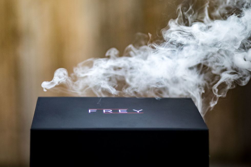 a box of frey surrounded by smoke