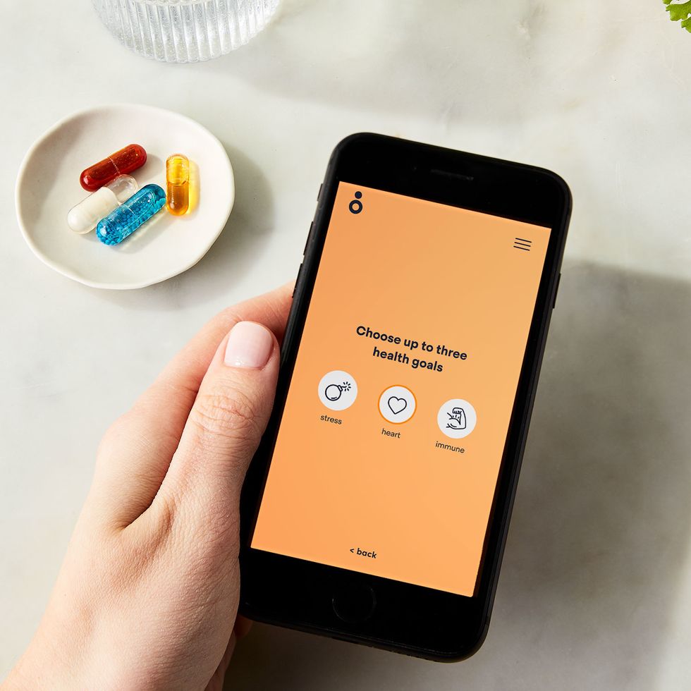 Iphone screen shows stress, heart health, and immune system selected as health goals